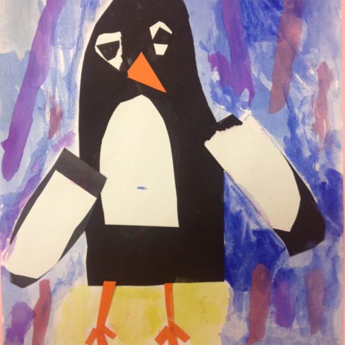 A penguin is painted on a piece of paper.