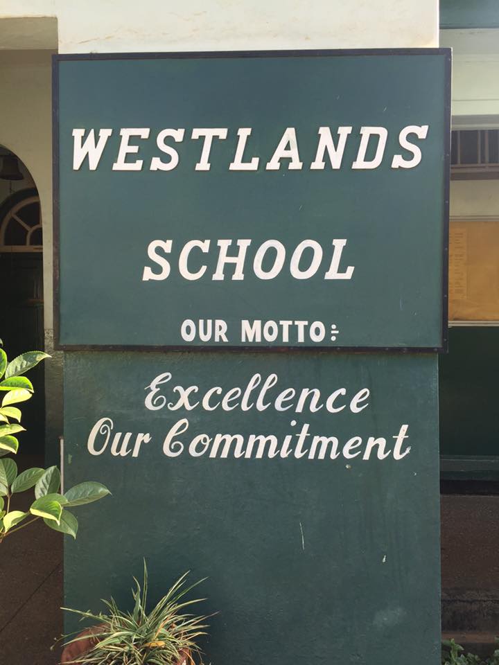 A sign that reads westlands school.