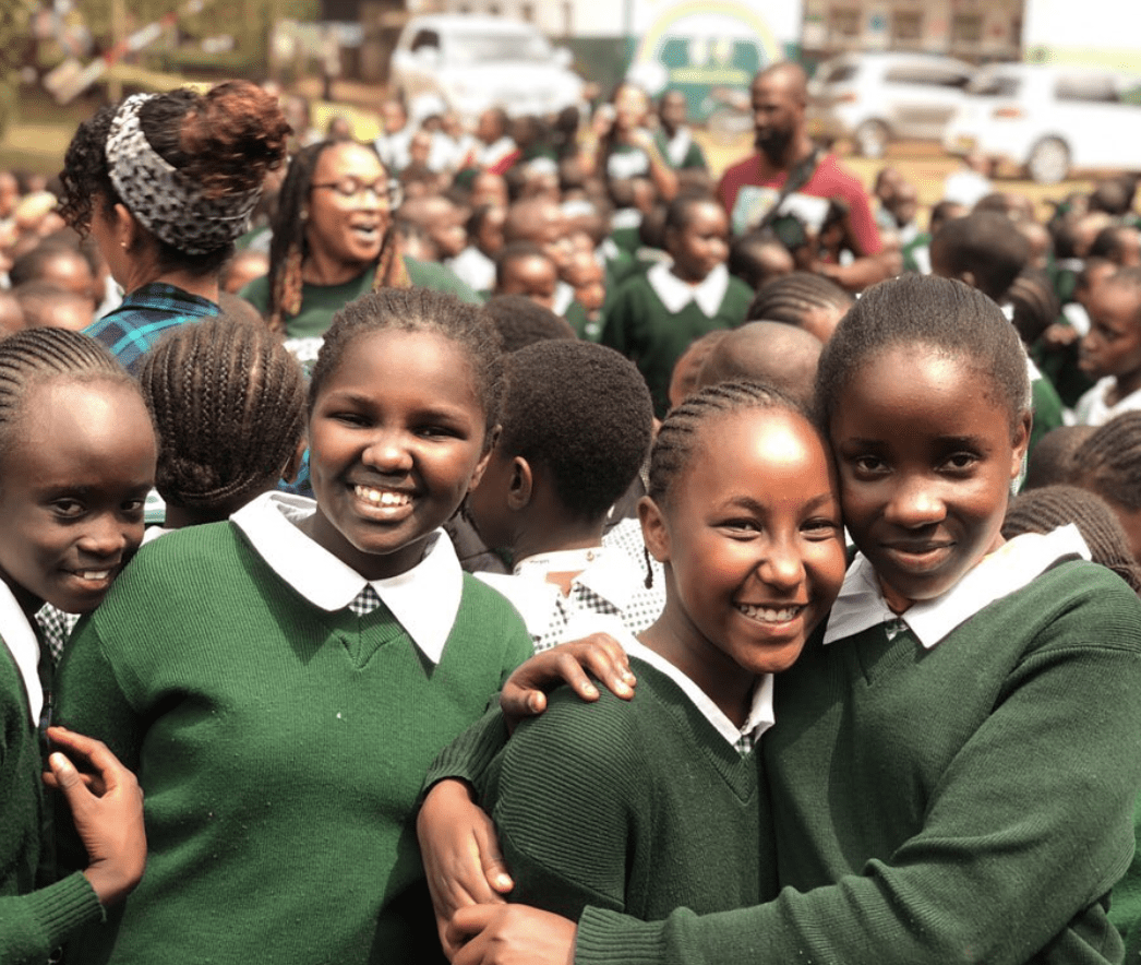 Group of girls in school uniform smiling